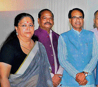 Rajasthan Chief Minister Vasundhara Raje and her Madhya Pradesh counterpart Shivraj Singh Chauhan participate in the 4th meeting of CM's sub group of Niti Aayog in New Delhi on Saturday.  PTI