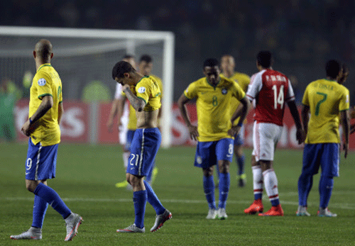 Brazil's players react during a Copa America quarterfinal soccer match at the Ester Roa Rebolledo Stadium in Concepcion. AP Photo