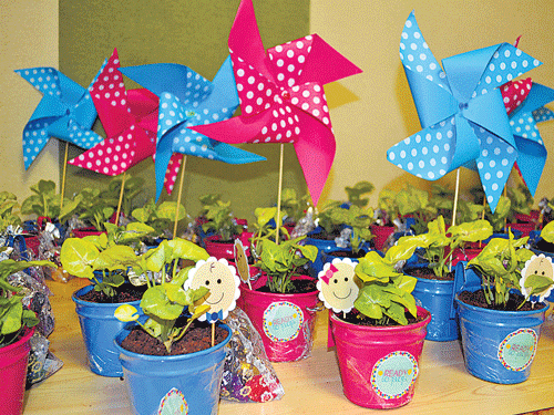 vibrant ideas A view of the 'baby shower return favours' and (right) Pooja Haria.
