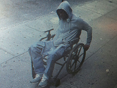 A man gets away after he robbed the Santander bank in the Queens borough of New York. After receiving over $1,200 in bills, police say the suspect then fled westbound on Broadway in the wheelchair. He remains at large. AP Photo.