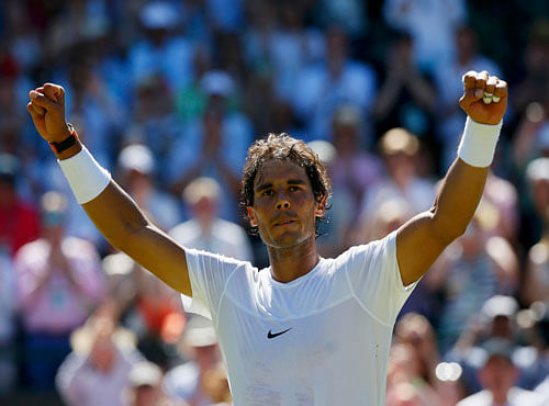 Rafael Nadal of Spain celebrates after winning his match against Thomaz Bellucci of Brazil at the Wimbledon Tennis Championships in London. Reuters photo