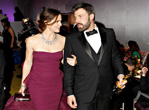 Jennifer Garner and Ben Affleck leave the Governors Ball following the 85th Academy Awards in Hollywood. Reuters file photo