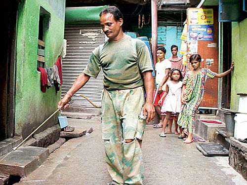 'Sweeper' boxer seeks a job of dignity from Mamata govt