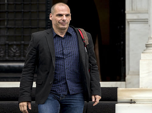 File picture shows Greek Finance Minister Yanis Varoufakis leaves after a meeting at the office of Prime Minister Alexis Tsipras in Maximos Mansion in Athens. Reuters photo