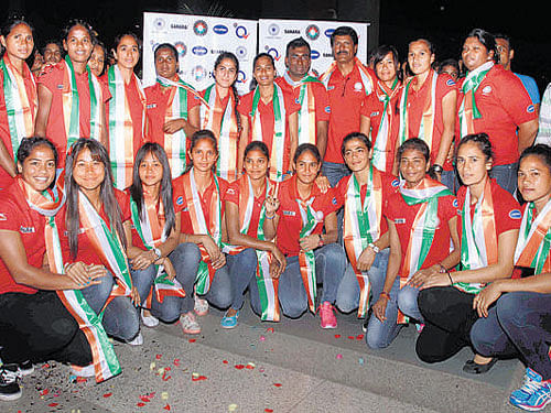 ndianwomen's hockey teamafter its arrival in New Delhi on Monday. PTI