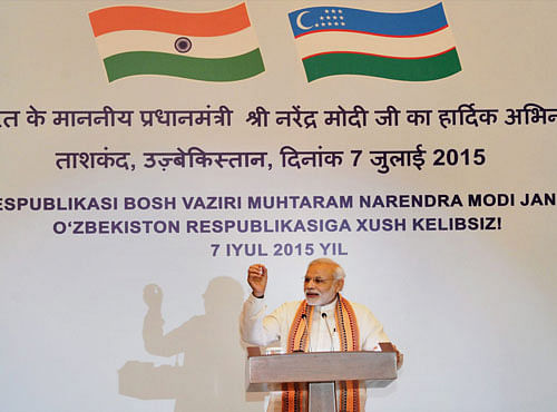 Prime Minister, Narendra Modi addresses the Indologists, students of Hindi and Indian community members, in Tashkent, Uzbekistan on Tuesday. PTI Photo