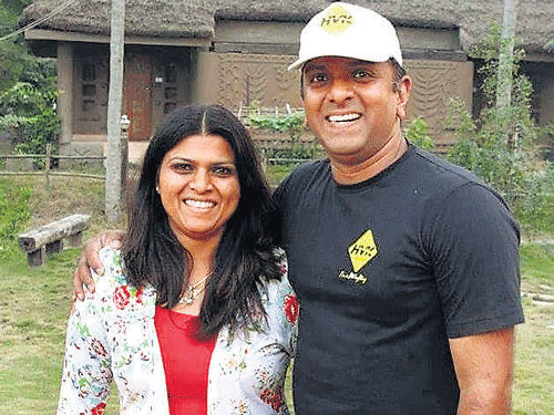 Enthusiastic: Smitha Prasad with husband.