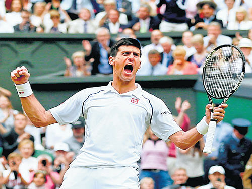 moment to savour: Novak Djokovic celebrates after beating Roger Federer in the Wimbledon final on Sunday. reuters