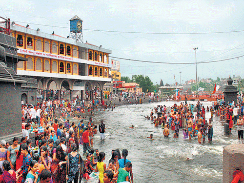 The busy Ramkund area on Monday on the eve of Simhastha Kumbh Mela. DH Photo