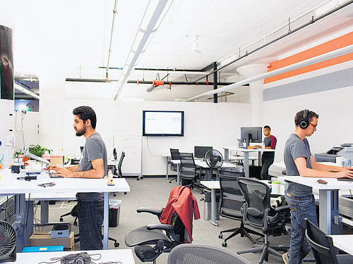 Reddit employees at work in the online message board's headquarters in San Francisco. INYT