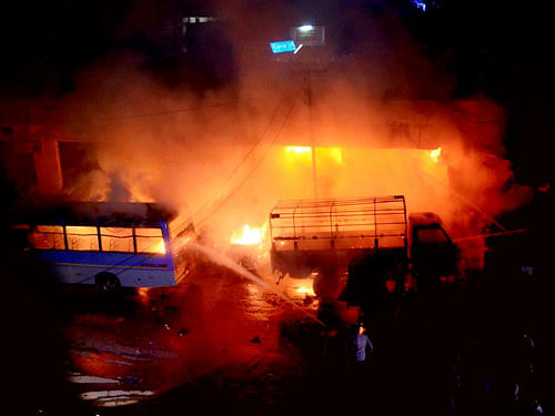 Fire workers at work after a cylinder blast at hotel in Rajahmundry in Andhra Pradesh on Wednesday. PTI