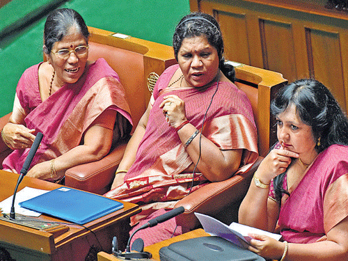 Legislators Shakuntala Shetty, Sharada Mohan Shetty and Vinisha Niro seen in pink sarees during the Assembly session in Bengaluru on Thursday. DH PHOTO