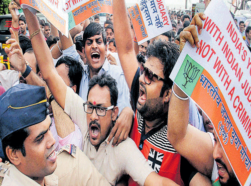 BJP workers protest outside Salman Khan's house. PTI photo