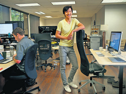 Sizing up: Paul Gu, co-founder and head of product at Upstart, a loan company, at the company's offices in Palo Alto, California. The company is among a new generation applying mathematical models to determine if you will pay back a loan or stay in a job. nyt