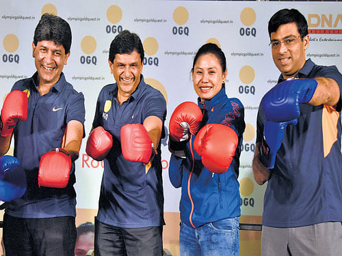 champions' meet (From left) Olympic Gold Quest co-founders Geet&#8200;Sethi and Prakash Padukone, boxer Sarita Devi and chess ace Viswanathan Anand pose during a function in   Bengaluru on Tuesday. dh photo