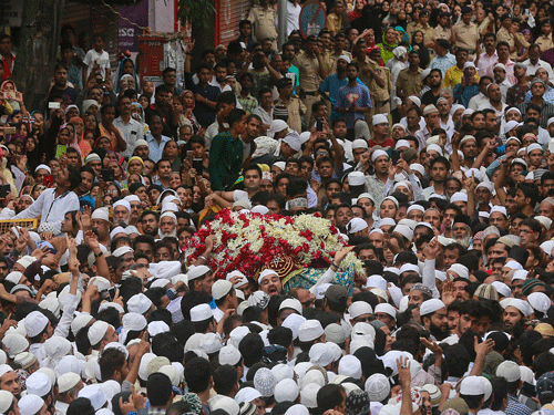 People carry the body of Yakub Abdul Razak Memon, outside his family residence during his funeral in Mumbai. AP Photo