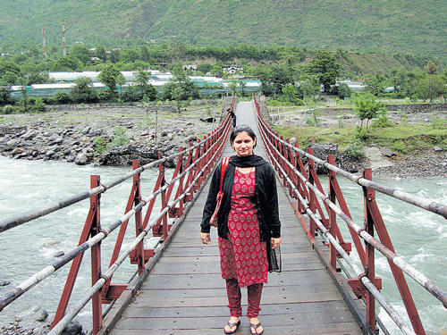 Serene: The author on a bridge near Ranikhet.