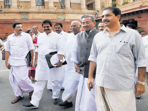 Congress leader Mallikarjun Kharge with other party MPs at Parliament House in New Delhi on Monday.  PTI