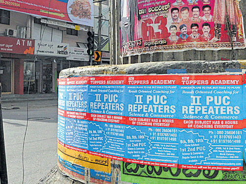 A hoarding and posters harm the aesthetics on RV&#8200;Road.