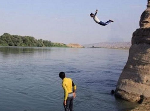 ISIS tourism brochure touts cliff jumping. Picture courtesy  jpost.com