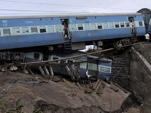 Damaged coaches of passenger trains are pictured after they derailed near Harda in Madhya Pradesh. Reuters Photo
