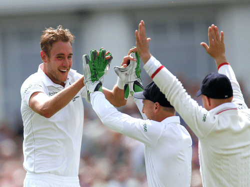 Stuart Broad celebrates after taking the wicket of Australia's Mitchell Johnson. Reuters Photo