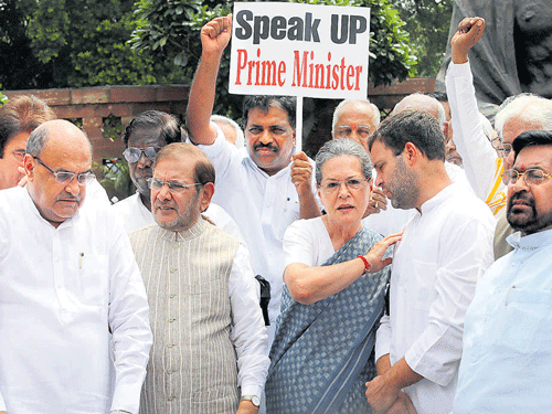 Lok Sabha Speaker Sumitra Mahajan said on Thursday that she can't revoke the suspension of 25 Congress parliamentarians suo motu and that no one had approached her on the matter till now. Meanwhile, the Congress members continued their protest for the third day on Thursday over the suspension of 25 parliamentarians. DH Photo/Chaman Gautam