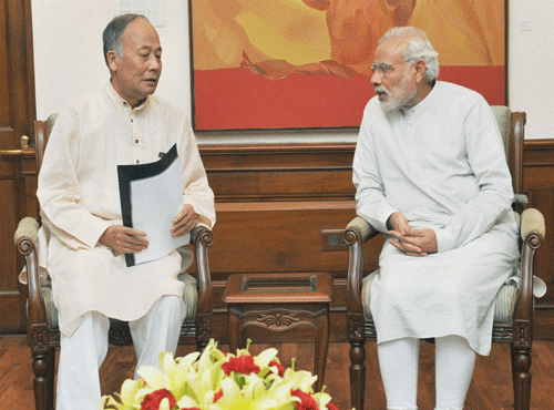Prime Minister Narendra Modi with Chief Minister of Manipur, Okram Ibobi Singh in a meeting in New Delhi on Saturday. PTI Photo