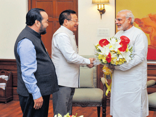 Prime Minister Narendra Modi with Nagaland Chief Minister T R Zeliang and Home Minister of Nagaland Y Patton in a meeting in New Delhi on Saturday. PTI Photo