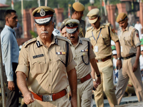 Delhi Police Commissioner BS Bassi inspecting arrangements for 69th Independence Day function at the historic Red Fort in New Delhi on Thursday. PTI Photo.