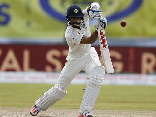 Virat Kohli drives through the offisde during his century on the second day of the first Test at Galle on Thursday. Reuters