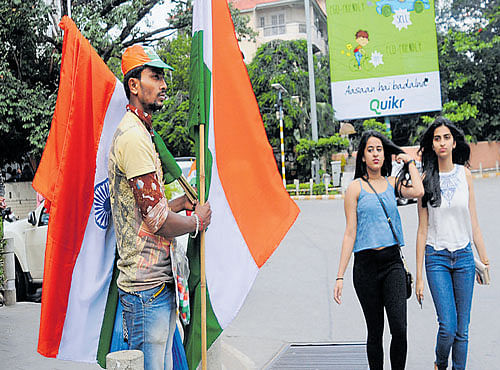PATRIOTIC FERVOUR Independence Day comes with a sense of pride and carries the hopes ofmany. DH PHOTO