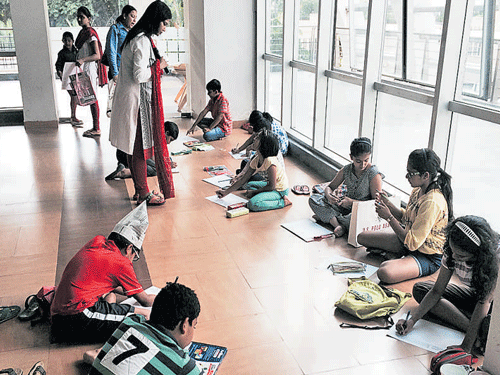 Children take part in a painting contest organised by Deccan Herald on Friday ahead of Independence Day. DH Photo