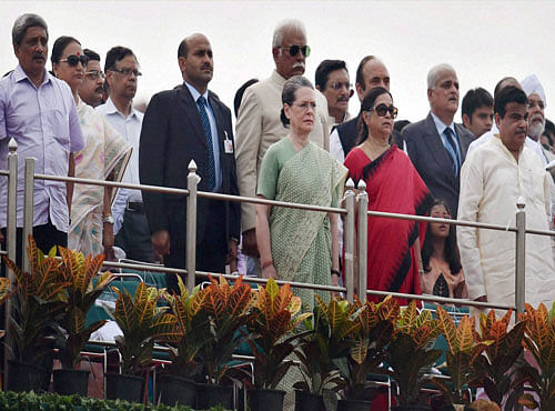 Dignitaries at the time of national anthem during the 69th Independence Day function at the historic Red Fort in New Delhi on Saturday. PTI Photo