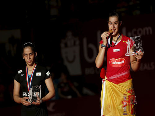 Spain's Carolina Marin and India's Saina Nehwal. Reuters Photo.
