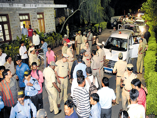 Police cordon off the Nimhans premises after the shooting incident on Sunday. dh photo