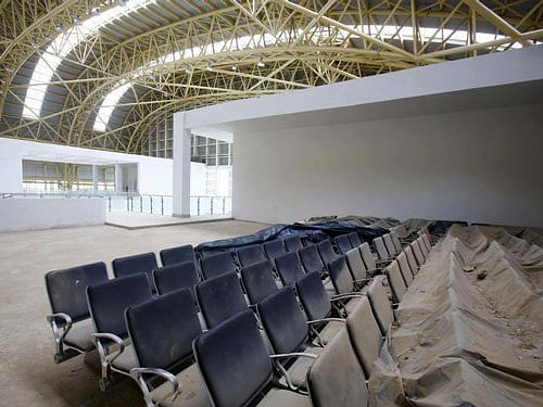 Dust covered seats are pictured inside the lounge of the Jaisalmer Airport in Rajasthan. Reuters