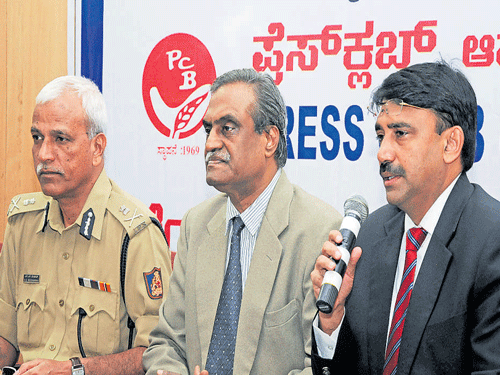 BBMP Commissioner G Kumar Naik speaks at a press meet on Thursday. Police Commissioner N S Megharikh and State Election Commissioner P N Srinivasachari look on. DH&#8200;PHOTO