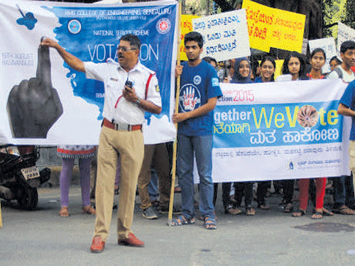 Students of BMS College of Engineering take part in Votathon, a rally to create awareness about voting, on  Thursday. DH&#8200;PHOTO