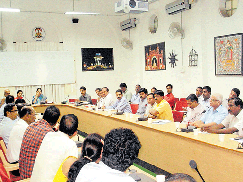 Deputy Commissioner C&#8200;Shikha holds a meeting with the representatives of various public and private sector industries in Mysuru recently. DH photo