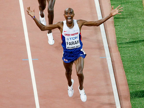 Mo Farah of Britain celebrates winning the men's 10,000 metres final at the 15th IAAF World Championships at the National Stadium in Beijing, China August 22, 2015. Reuters Photo.
