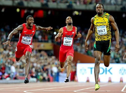 Gatlin and Gay from the U.S. and Bolt of Jamaica compete in the men's 100m final during the 15th IAAF World Championships at the National Stadium in Beijing. Reuters photo