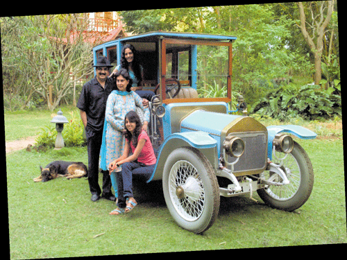 proud Dr Ravi Prakash and Sabena with daughters Rupali (in red) and Shefali with the 1909 Wolseley.