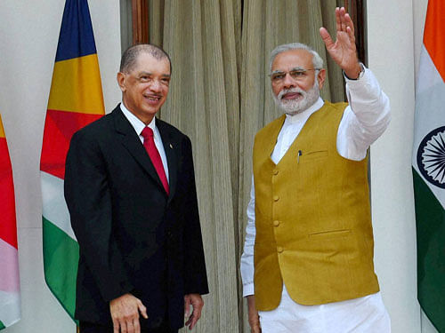 Prime Minister Narendra Modi with President of the Republic of Seychelles, James Alix Michel before their meeting at Hyderabad House, in New Delhi on Wednesday. PTI Photo