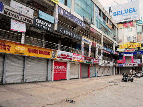 A closed market during a bandh called by Patel community in support of their demand for reservation in Ahmedabad on Wednesday. PTI Photo