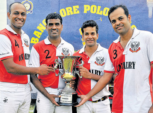 FINE EFFORT 61 Cavalry Polo Club, winners of the Gyan Jyothi Cup in Bengaluru on Wednesday. (From left): Maj Arjun Patil, Dfr Iliyas Ali, Capt Aman Singh and Cdr Akhil Sirohi. DH PHOTO.