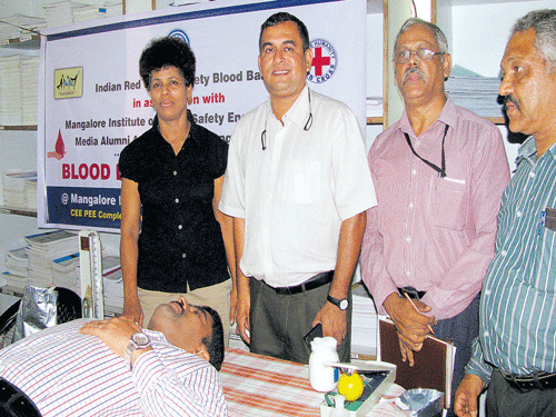 MIFSE Managing Director Vinod K&#8200;John donates blood at a recent camp organised by MIFSE in association with Indian Red Cross Society Blood Bank and MAAM. DH photo