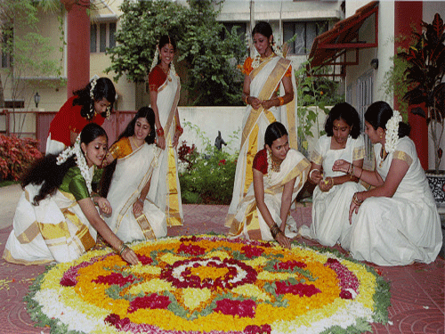 Keralites celebrate Onam festival by decorating 'Pookalam' in Bengaluru. DH photo