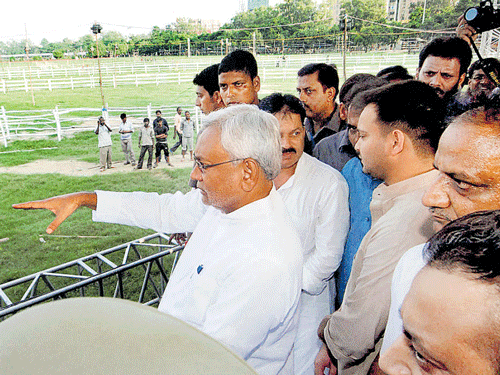 Bihar Chief Minister Nitish Kumar with RJD youth leader Tejaswi Yadav and Congress state president Ashok  Chaudhary inspects the preparation of 'Swabhimaan Rally'  at Gandhi Maidan in Patna on Friday. PTI