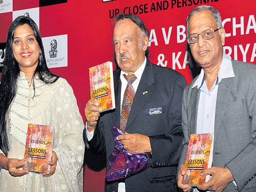 Infosys co-founder N R Narayana Murthy releases the book on 'Living Legends Learning Lessons' written by Bala V Balachandran (centre) and Kavipriya in the City on Friday. DH photo